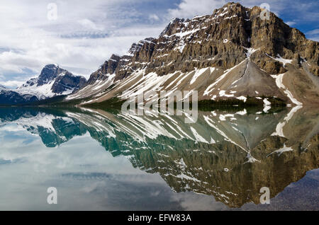 Crowfoot Mountain reflected in Bow Lake, in Banff national park. Stock Photo