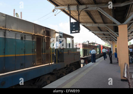 Uncoupling the emergency engine from a broken down train, Galle railway station, Galle, Southern province, Sri Lanka. Stock Photo