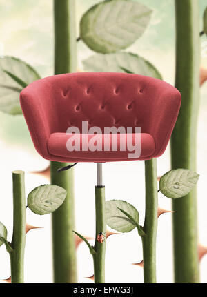 Red Chair with rose stem and thorn. Stock Photo