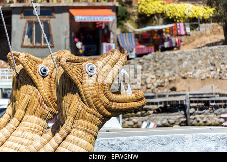 Animal shaped reed boat, or totora, on the Isla del Sol on Lake Titicaca Stock Photo