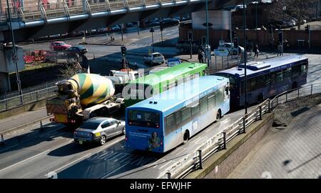 Buses and cars on a busy Middle Hill Nottingham England UK Stock Photo