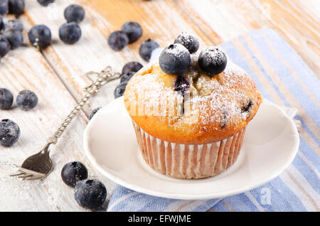 Blueberries muffins   on  white plate. Selective focus Stock Photo