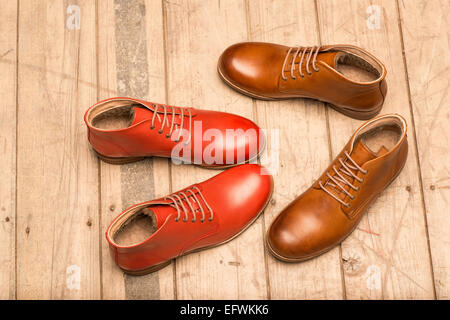 Men Brown Shoes on wooden background Stock Photo