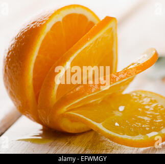 Fresh oranges on  wooden background. Selective focus Stock Photo
