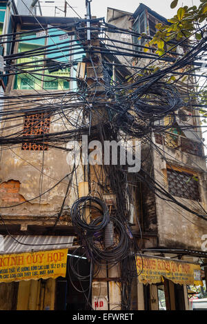 Electric pole in the old quarter, Hanoi, Vietnam. Stock Photo