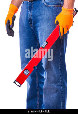 man holding a tool in the hands of the level Stock Photo
