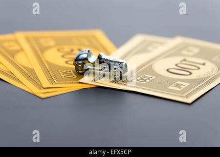 February 8, 2015 - Houston, TX, USA.  Monopoly car and money Stock Photo