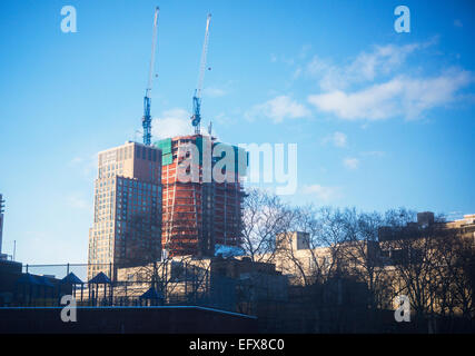 Construction on the Hudson Yards project, right, with a rental building along the High Line Park losing its northern views in New York on Thursday, February 5, 2015.  (© Richard B. Levine) Stock Photo
