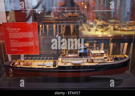 De Zwarte Zee tugboat scale model in Maritime Museum in Rotterdam, Holland, Netherlands. Stock Photo