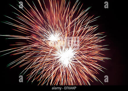 Beautiful firework against black sky Stock Photo