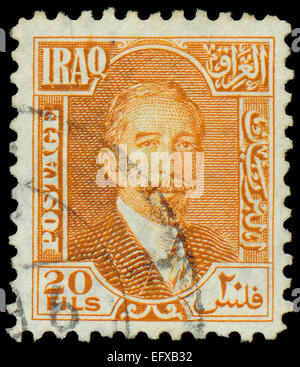 IRAQ - CIRCA 1932: A stamp printed in Iraq shows Faisal I of Iraq, circa 1932 Stock Photo