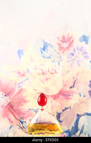 Bottle of perfume on vintage background Stock Photo