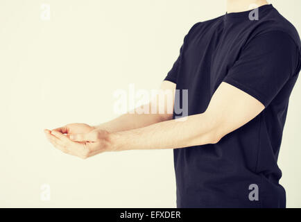 mans hands showing something Stock Photo