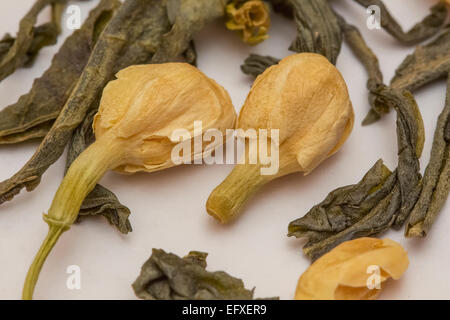 Macro of Chinese jasmine green tea on white paper Stock Photo