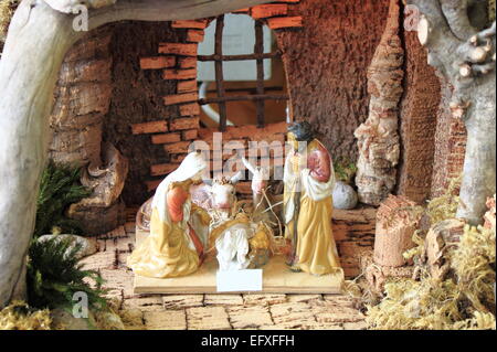 Christmas Nativity scene with hand-colored figures made out of wood ...