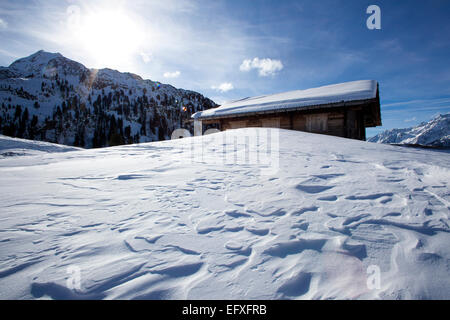 Ski hut in the sunny and snowy Austrian Alps Stock Photo