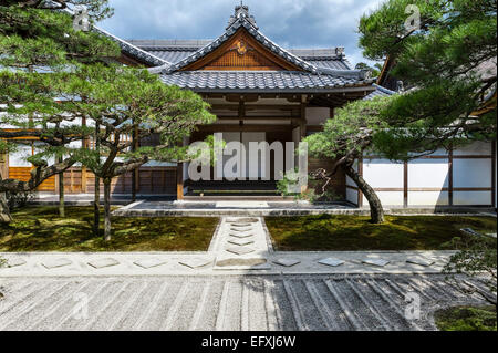 The entrance gate to Ginkaku-ji (Jisho-ji), the Temple of the Silver Pavilion, Kyoto, Japan, with the raked sand garden of Ginshadan in the foreground Stock Photo