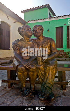 Vertical close up of lifelike comical bronze statues in Camaguey, Cuba. Stock Photo