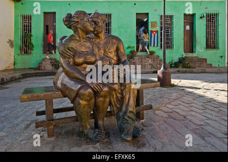 Horizontal close up of lifelike comical bronze statues in Camaguey, Cuba. Stock Photo