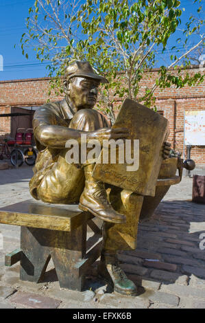 Vertical close up of lifelike comical bronze statues in Camaguey, Cuba. Stock Photo