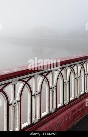 A steel sculpture called  'The Wave' along side the Usk river in the center of Newport City in Wales. Stock Photo