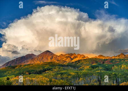 Gunnison National Forest, CO: Billowing clouds over the Ruby Range in early fall Stock Photo