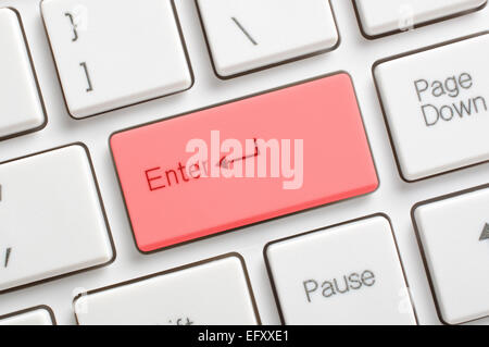 Red enter key on keyboard Stock Photo