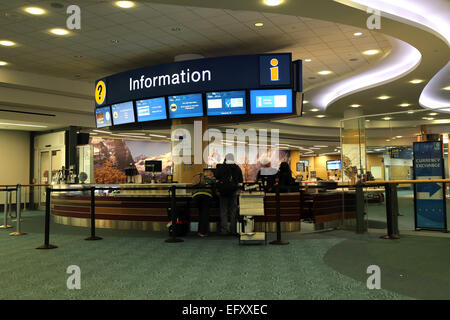 Vancouver, BC Canada - September 13, 2014 : People asking some information insdie the YVR airport in Vancouver BC Canada. Stock Photo
