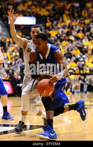 Wichita, Kansas, USA. 11th Feb, 2015. Indiana State Sycamores guard Devonte Brown (11) drives past Wichita State Shockers guard Fred VanVleet (23) for two of his 10 points during the NCAA Basketball game between the Indiana State Sycamores and the Wichita State Shockers at Charles Koch Arena in Wichita, Kansas. Kendall Shaw/CSM/Alamy Live News Stock Photo