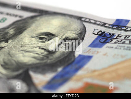 close up of Benjamin Franklin stare on one hundred dollars banknote Stock Photo