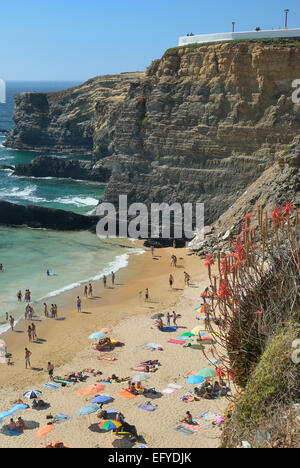 Sandy beach Praia de Zambujeira, surrounded by rugged cliffs, Costa Alentejana, Western Algarve, Algarve, Portugal Stock Photo