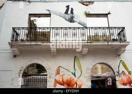 Panama city, Casco Viejo old ruined houses with a graffiti painted. Panama Viejo historic town listed as World Heritage by UNESC Stock Photo