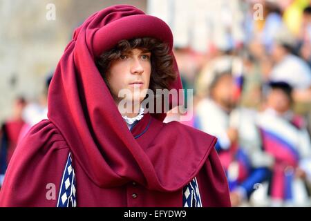 Medieval costume at the parade before the historical horse race Palio di Siena, Piazza del Campo, Siena, Tuscany, Italy Stock Photo