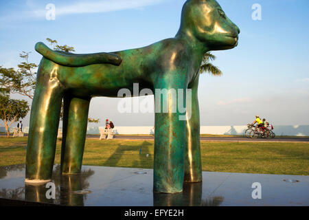 Sculpture of a panther at Green area in Cinta Costera Pacific Ocean Coastal Beltway Bahia de Panama linear park seawall skyline Stock Photo