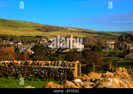 Abbotsbury village Dorset England UK set in the English countryside with blue sky in rich colours known for its swannery Stock Photo