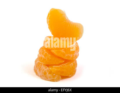 Five stacked slices of ripe and fresh mandarin or tangerine on white background Stock Photo