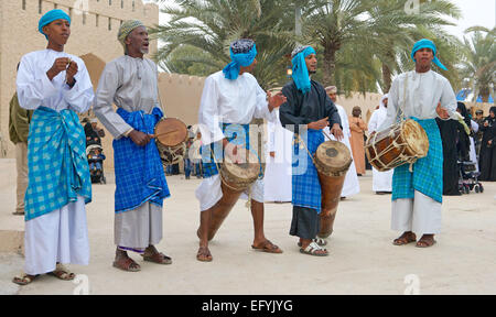 Omani musicians providing music for a tribal dance during the Muscat Festival in the Sultanate of Oman. Stock Photo