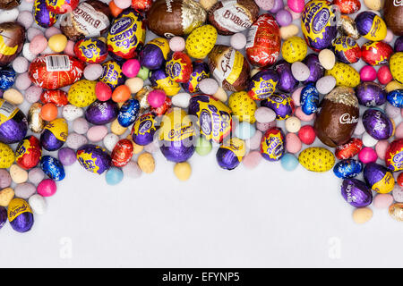 Chocolate mini easter eggs on white background Stock Photo