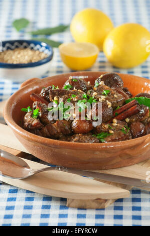 Afelia. Pork with red wine and coriander seed Stock Photo - Alamy