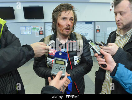 Thursday. 12th Feb, 2015. Czech Republic's skier Ondrej Bank speaks with media after his arrival to Prague on Thursday, February 12, 2015. He was injured in crashing during the downhill portion of the men's Alpine combined competition at the Alpine skiing world championships on Sunday, February 8, in Beaver Creek, Colorado, USA. © Michal Dolezal/CTK Photo/Alamy Live News Stock Photo