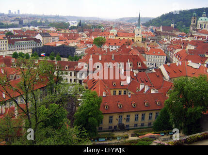 PRAGUE, CZECH REPUBLIC - APRIL 26. View of the rooftops of the old and well-preserved city of Prague. Stock Photo