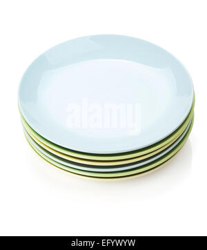 Colorful plates and saucers. Isolated on white background Stock Photo