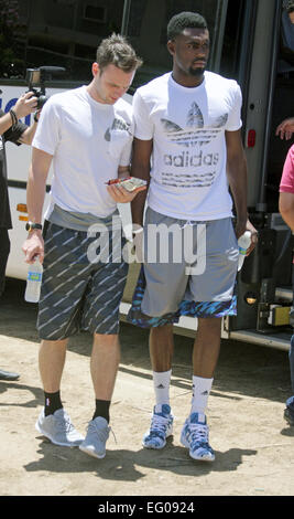 Carmelo Anthony Foundation presents a basketball court to the resindents of Los Olmos low income housing project  Featuring: Tim Hardaway,Jr. Where: Rio Piedras Puerto Rico, Puerto Rico When: 10 Aug 2014 Stock Photo