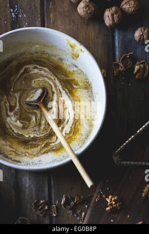 Baking mixture for salty maple walnut pie. Stock Photo