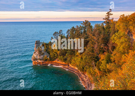 Pictured Rocks National Lakeshore, MI: Sunset light after a clearing storm on Miner's Castle on Lake Superior in fall Stock Photo