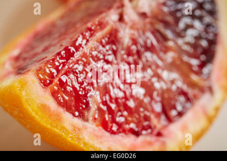 A wedge of moro orange, the American equivalent of a blood orange Stock Photo