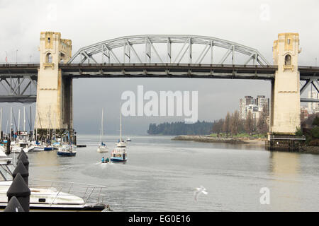 Burrard Street Bridge over waters of False Creek from Granville Island in Vancouver Canada Stock Photo