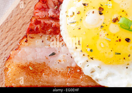 Sandwich with fried eggs and smoked bacon Stock Photo