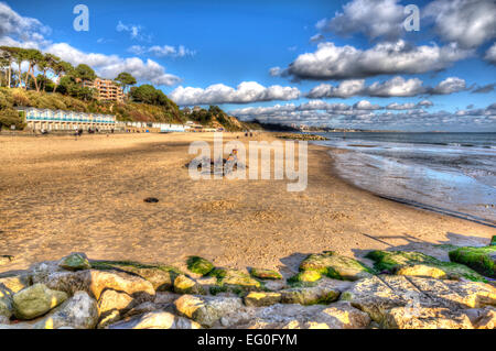 Branksome beach Poole Dorset England UK with cloudscape near to Bournemouth like painting in vivid bright colour HDR Stock Photo