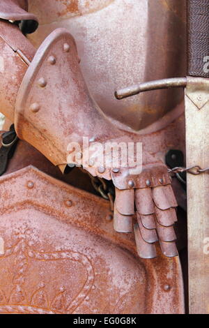 Iron gauntlet of a medieval armor Stock Photo